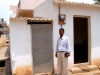 Roger and Simon visit with Pastor Gopi Daniel and family