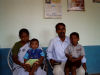 Roger and Simon visit with Pastor Gopi Daniel and family