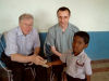 Roger and Simon visit with Pastor Gopi Daniel and family