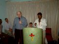 Vic preaching at service at school