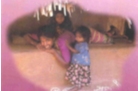 Photograph of woman with two children